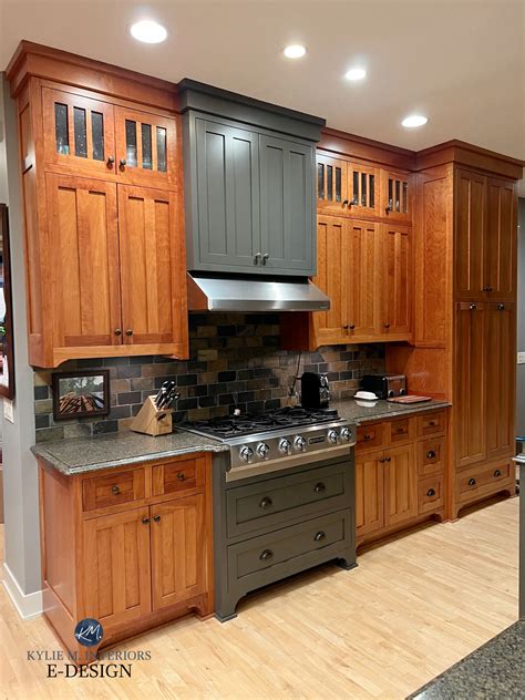 stainless steel vs slate appliance against honey oak cabinets|honey oak cabinet finish.